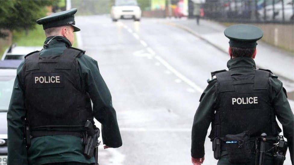 Image of two police officers walking