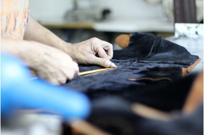 Image of somebody working with clothes